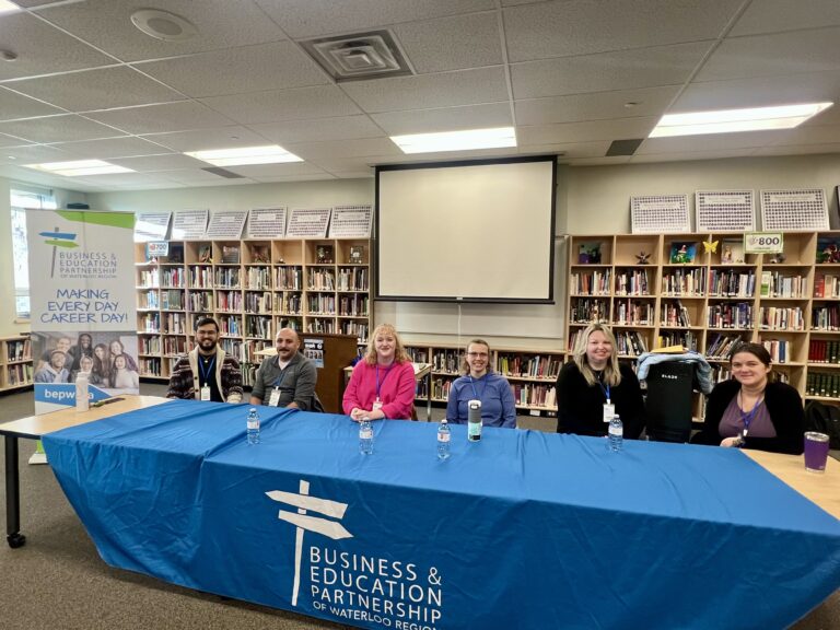 Copy of SB-BluevaleCollegiateGMC-AMPanel-GroupShotatTable